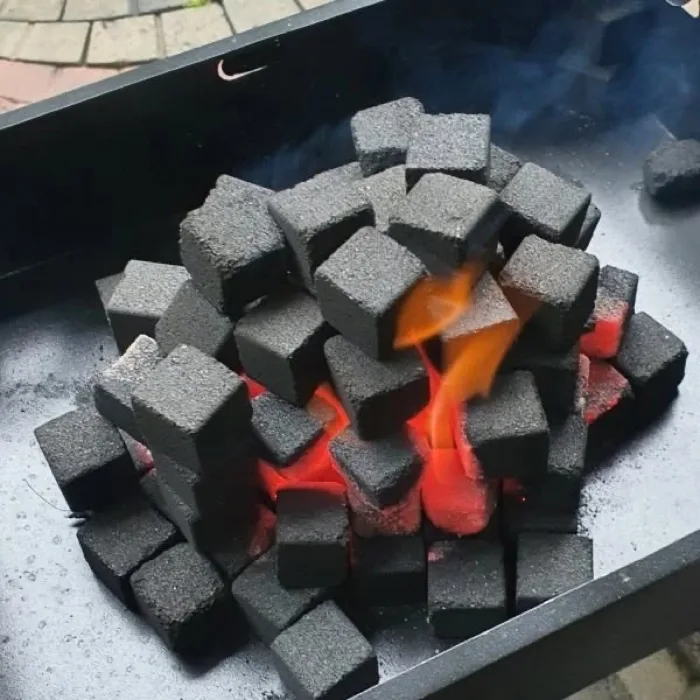 Coconut shell charcoal briquette burning